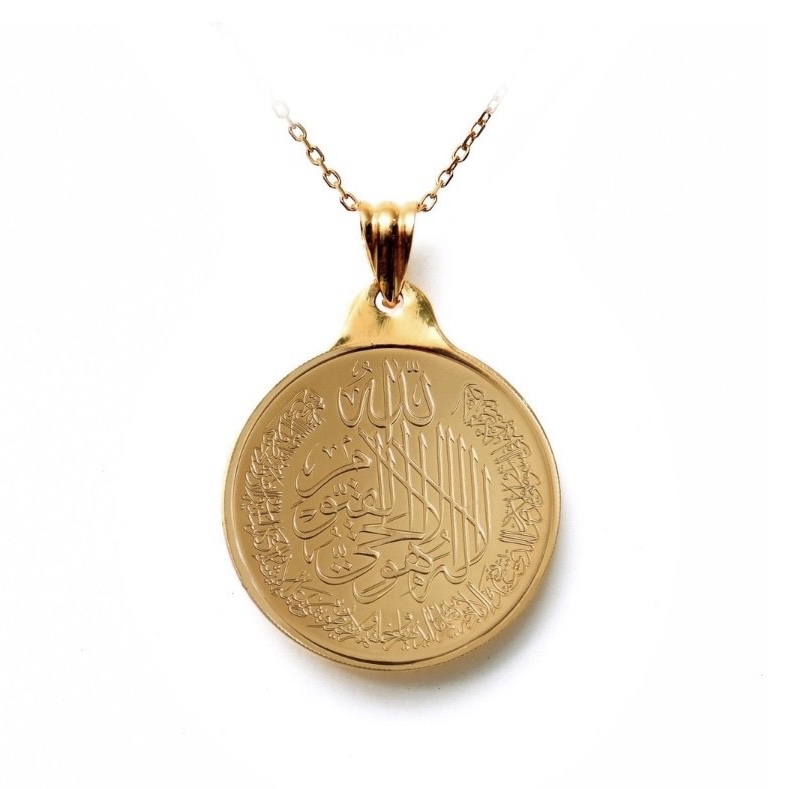 A quarter-pound coin pendant from BTC.